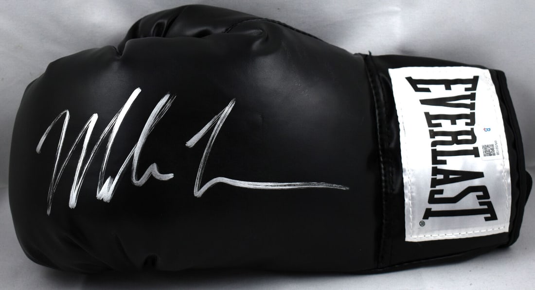 Mike Tyson Autographed Left Black Everlast Boxing Glove with Beckett Authentication: Mike Tyson Autographed Left Black Everlast Boxing Glove with Beckett Authentication Mike Tyson Autographed Black Everlast Boxing Glove- Beckett W Hologram *Left. Sport: Boxing. Product: Glove. Origina