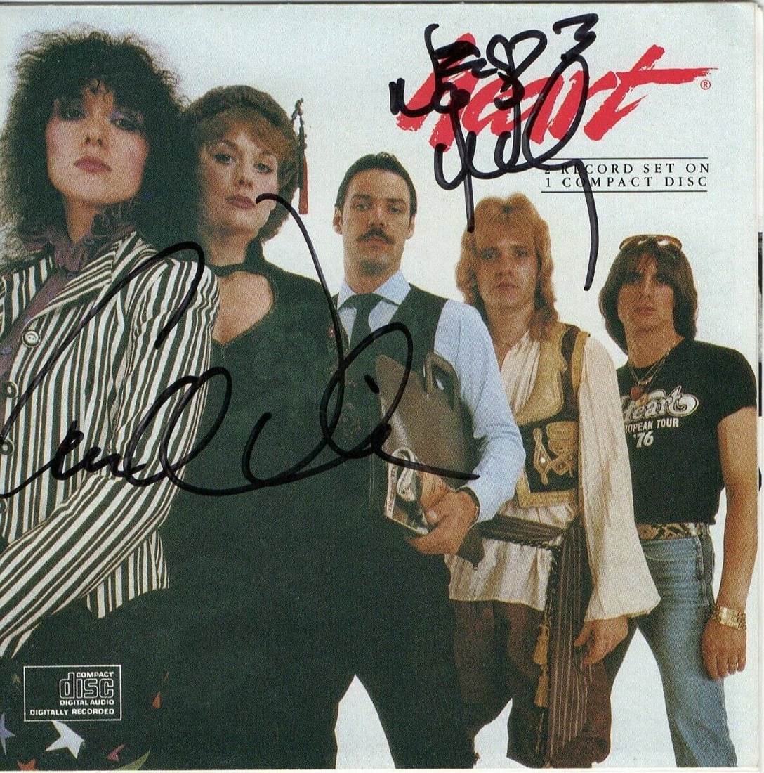 Ann & Nancy Wilson Dual Signed Original CD Booklet Heart JSA Authenticated: Ann & Nancy Wilson Dual Signed Original CD Booklet Heart JSA Authenticated This item features a Dual Signed Autographed CD Booklet by Ann & Nancy Wilson of the band Heart. It is an original piece, aut