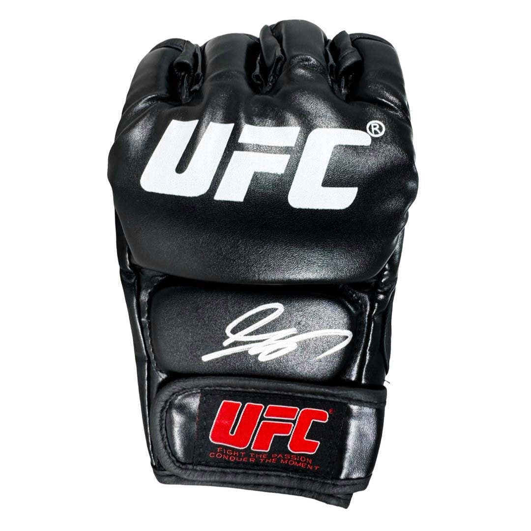 George St-Pierre Signed UFC MMA Glove: George St-Pierre Signed UFC MMA Glove This professional UFC MMA glove has been personally hand signed by George St-Pierre and authenticated by JSA. It includes a tamper proof sticker from JSA, making