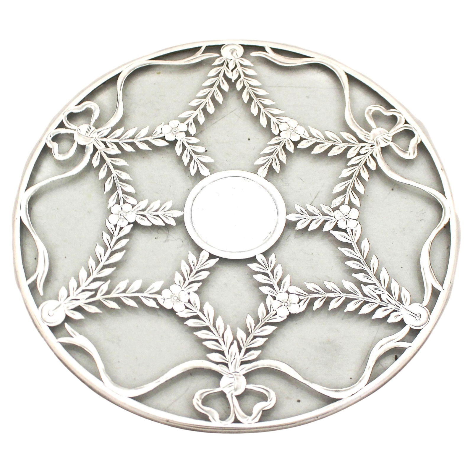 Sterling Silver Trivet by Webster & Company: Sterling Silver Trivet by Webster & Company This exquisite Sterling Silver trivet by Webster & Company features a glass top and measures 1 inch in height and 8 inches in diameter. Manufactured in the