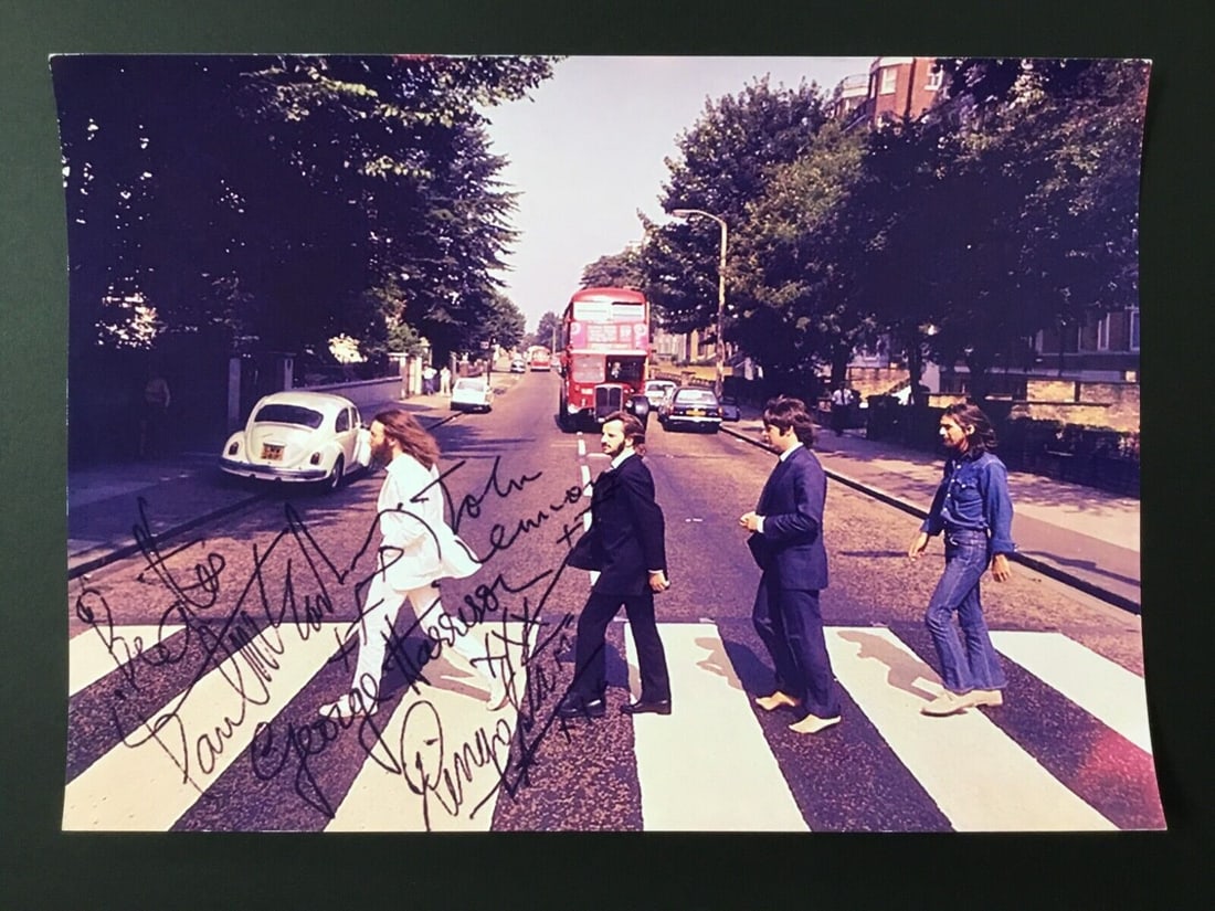 Beatles Abbey Road Facsimile Signed Music Photo 8.5in x 12in: Beatles Abbey Road Facsimile Signed Music Photo 8.5in x 12in This is a color reproduction photo of the Beatles' Abbey Road, featuring a facsimile signature. The image size is 8.5 x 12 inches. Perfect 