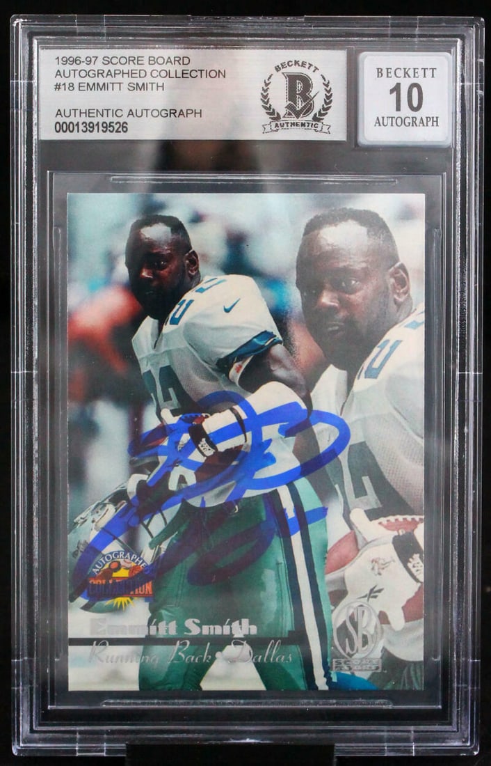 1996-97 Emmitt Smith Autographed Trading Card Dallas Cowboys BAS 10: 1996-97 Emmitt Smith Autographed Trading Card Dallas Cowboys BAS 10 This is a 1996-97 Emmitt Smith autographed trading card from the Score Board Autographed Collection. It features a hand-signed autog