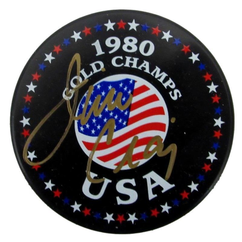Jim Craig Signed Hockey Puck 1980 Gold Champs Miracle on Ice JSA Certified: Jim Craig Signed Hockey Puck 1980 Gold Champs Miracle on Ice JSA Certified This is an original signed hockey puck by Jim Craig, commemorating the 1980 Gold Medal victory at the Miracle on Ice. The puc