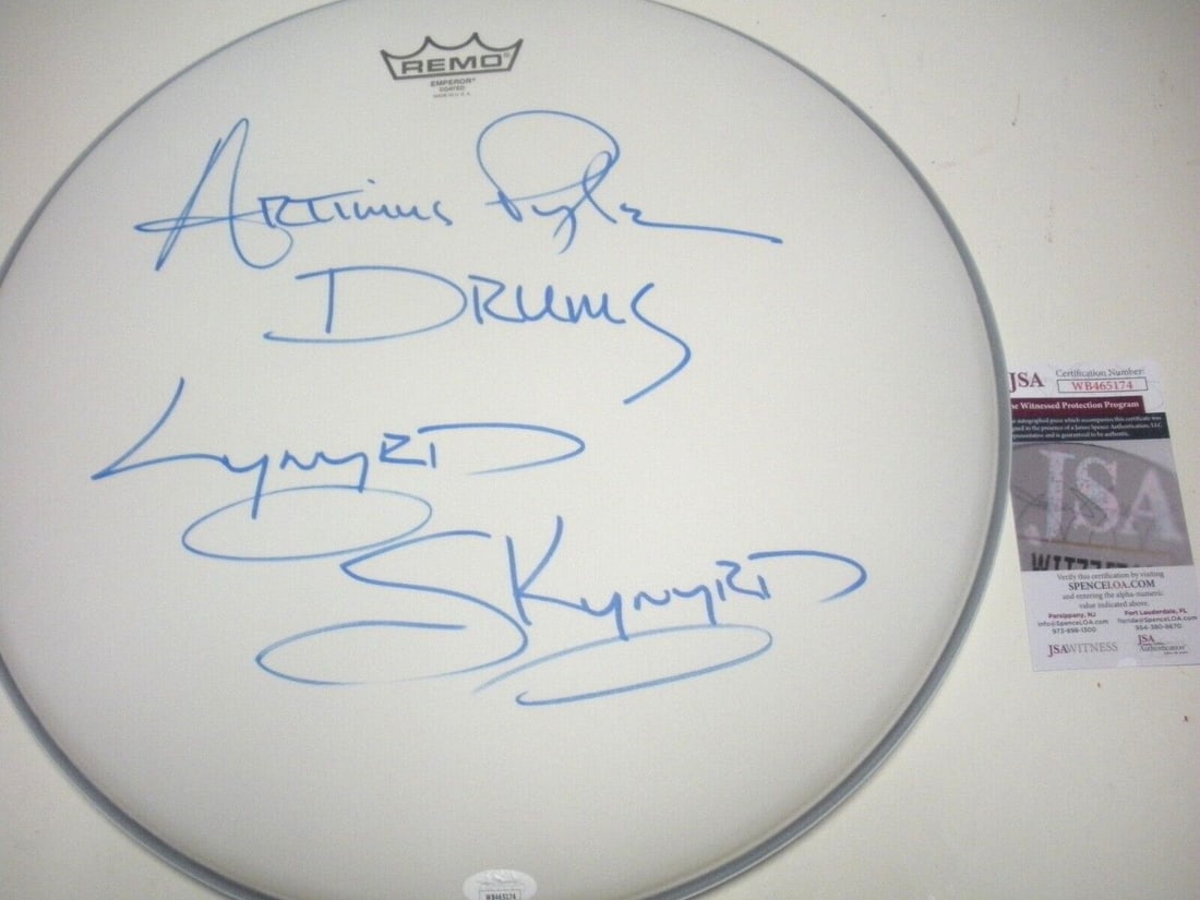 Artimus Pyle Lynyrd Skynyrd Signed Drumhead 16.5 inches: Artimus Pyle Lynyrd Skynyrd Signed Drumhead 16.5 inches This is an original drumhead signed by Artimus Pyle of Lynyrd Skynyrd, featuring blue autographs. It measures 16.5 inches and is from the brand 