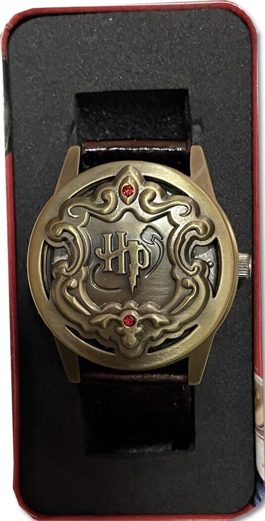 Harry Potter The Goblet of Fire Designer Watch Warner Bros: Harry Potter The Goblet of Fire Designer Watch Warner Bros This original designer watch features a Harry Potter theme inspired by 'The Goblet of Fire,' crafted by Warner Bros. A perfect collectible fo