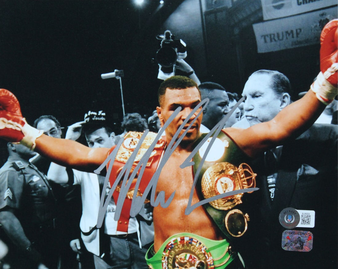 Mike Tyson Signed 8x10 Boxing Photo with Silver Signature: Mike Tyson Signed 8x10 Boxing Photo with Silver Signature Mike Tyson Signed 8x10 Spotlight Photo w/ Arms Out Silver Sig BAS. Sport: Boxing. Product: Photo. Original/Reprint: Original. Player: Mike Tys