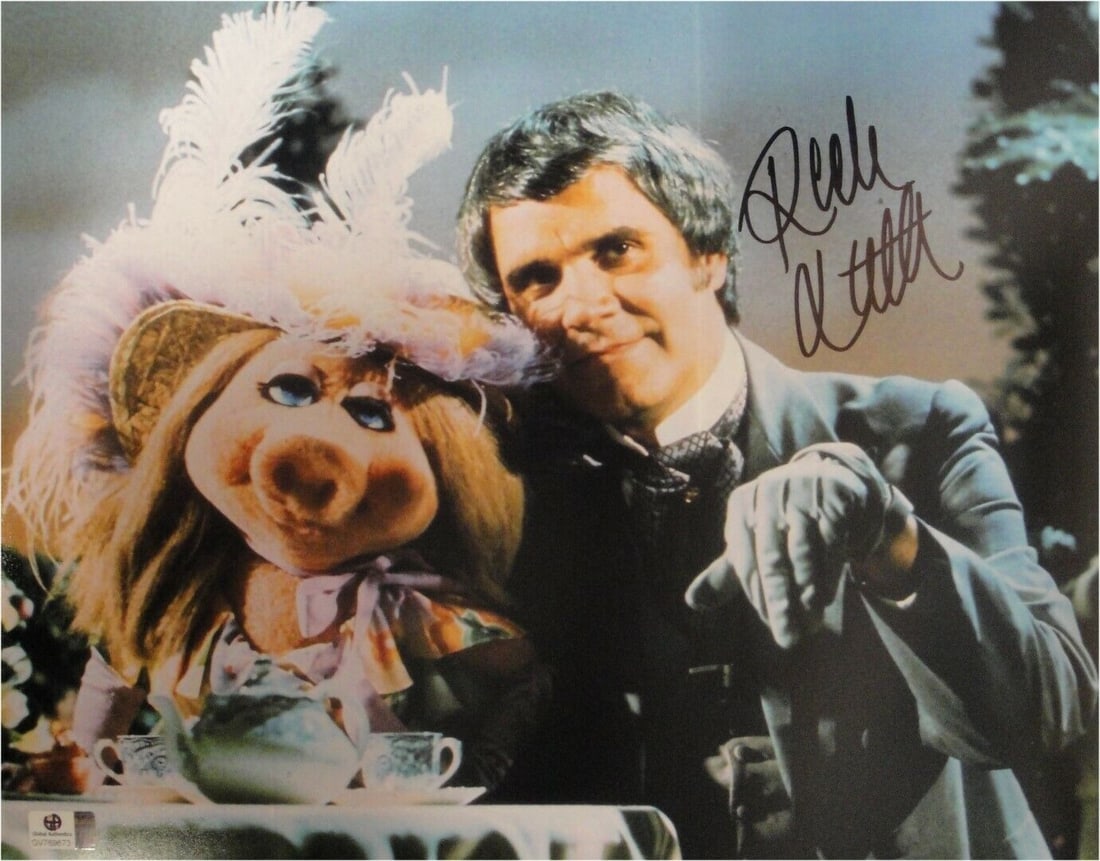 Rich Little Signed 11x14 Photo with Muppets Piggy JSA Authenticated: Rich Little Signed 11x14 Photo with Muppets Piggy JSA Authenticated Rich Little signed autographed 11x14 photo featuring the renowned comedian with Muppets character Piggy. This is an original photogr