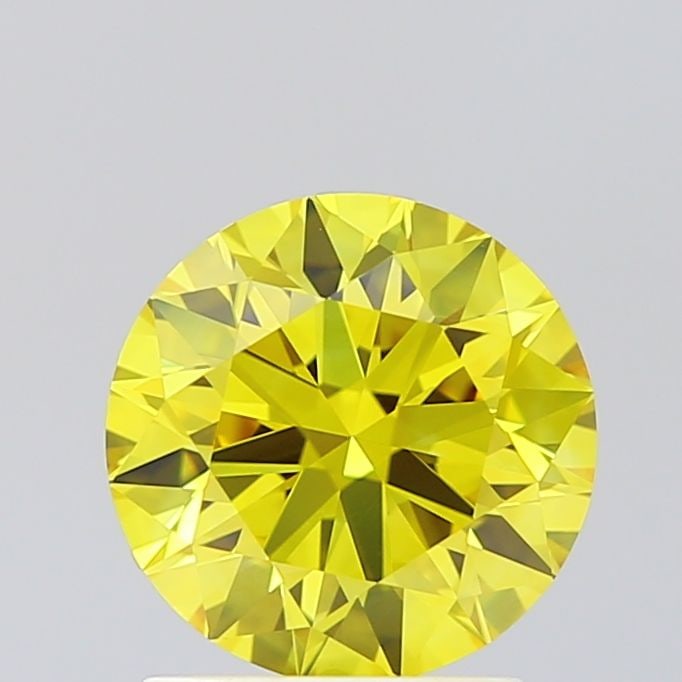 Ideal Loose Diamond - ROUND 1.71ct Fancy Vivid Yellow VVS2: Ideal Loose Diamond - ROUND 1.71ct Fancy Vivid Yellow VVS2 Source: This is a real non-mined Diamond that has been grown in a lab Shape: ROUND Carats: 1.71 Color: Fancy Vivid Yellow Certification: IGI 