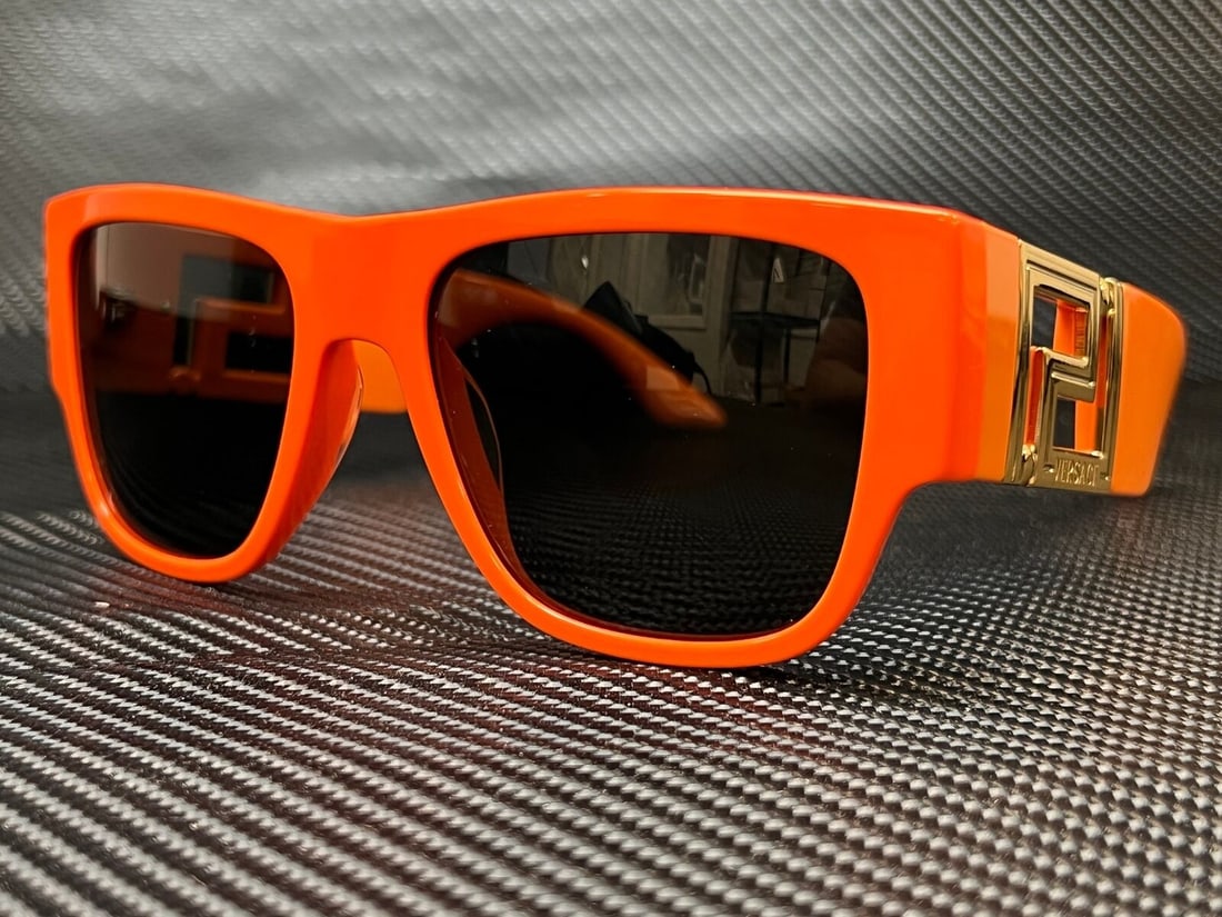 Versace VE4403 Orange Rectangle Sunglasses for Men: Versace VE4403 Orange Rectangle Sunglasses for Men Type: Sunglasses. Frame Color: Orange. Style: Rectangle. New Specifications Type:Sunglasses Frame Color:Orange Style:Rectangle The Mynt Guarantee: Al