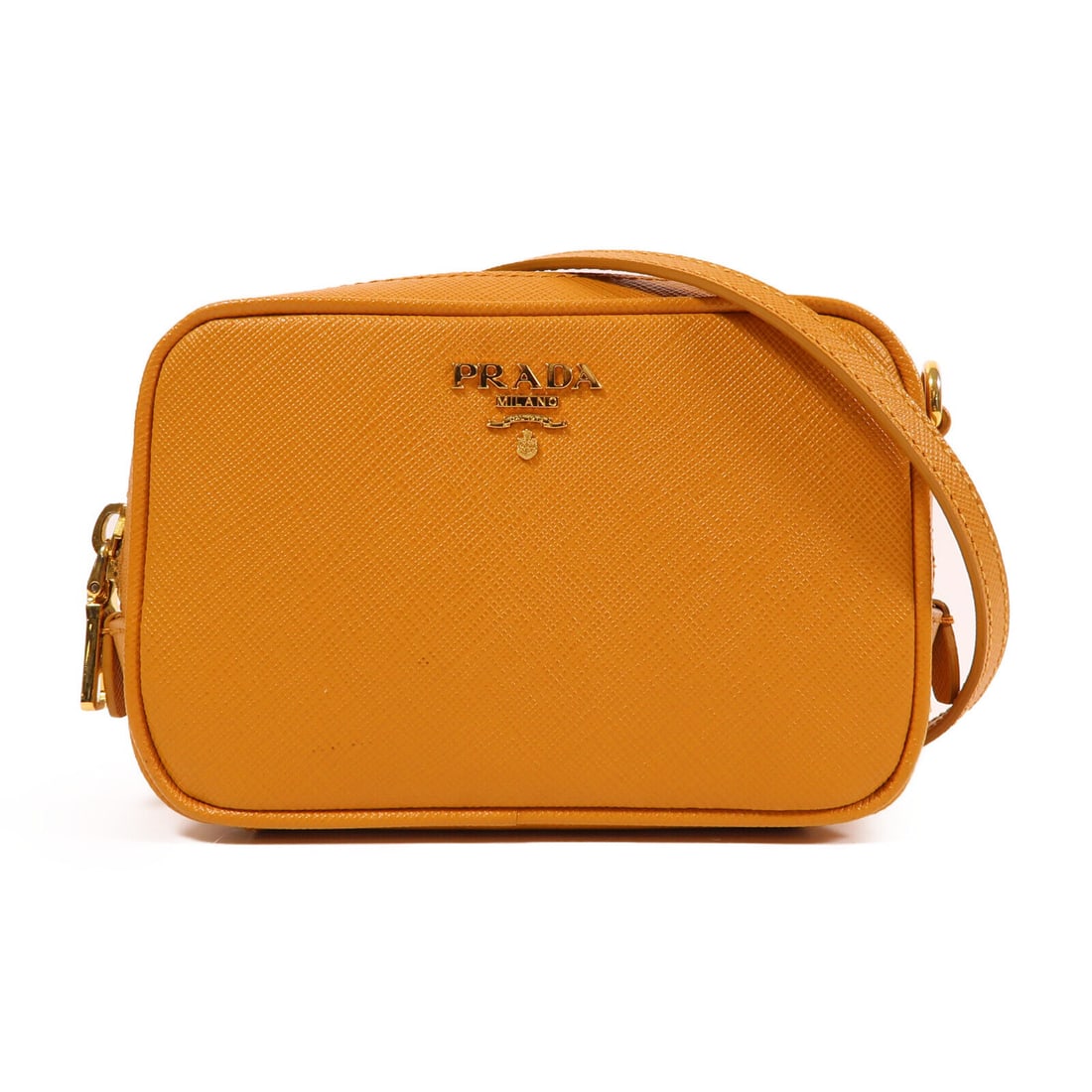 PRADA Saffiano Mini Shoulder Bag in Orange 1N1674: PRADA Saffiano Mini Shoulder Bag in Orange 1N1674 This PRADA mini shoulder bag is crafted from high-quality Saffiano leather in a vibrant orange color. The bag features a compact design, making it per