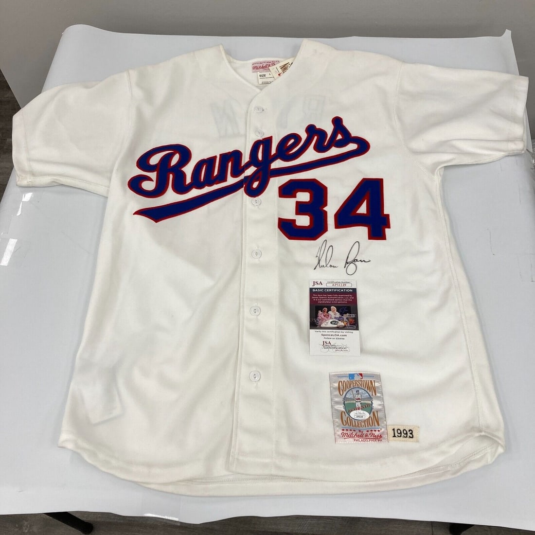 Nolan Ryan Signed 1993 Texas Rangers Jersey with JSA Certificate: Nolan Ryan Signed 1993 Texas Rangers Jersey with JSA Certificate This is an original Texas Rangers jersey, signed by Hall of Fame pitcher Nolan Ryan. The jersey features authentic Mitchell & Ness bran
