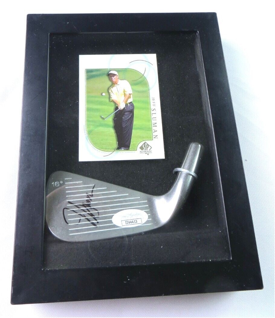 Jeff Sluman Autographed Golf Club Iron in Shadowbox JSA Certified: Jeff Sluman Autographed Golf Club Iron in Shadowbox JSA Certified This is an original golf club iron signed by professional golfer Jeff Sluman, displayed in a stylish shadowbox. The autograph has been