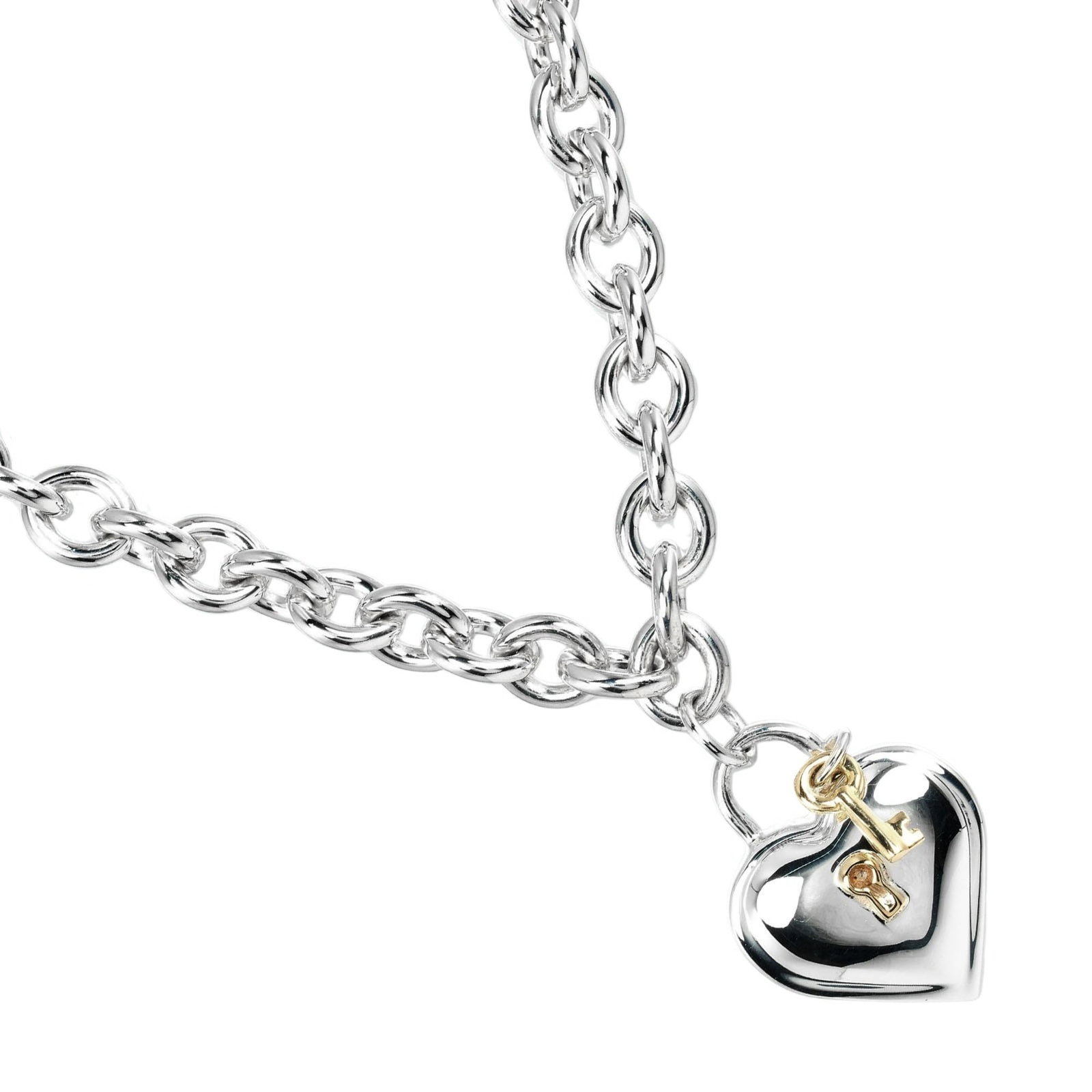 Tiffany Heart Lock Necklace 18K Gold Silver 925 64.74g 38cm: Tiffany Heart Lock Necklace 18K Gold Silver 925 64.74g 38cm Tiffany & Co. Heart Lock Necklace crafted from Silver 925 and 18K Gold, weighing approximately 64.74g. Designed for women, this necklace fea
