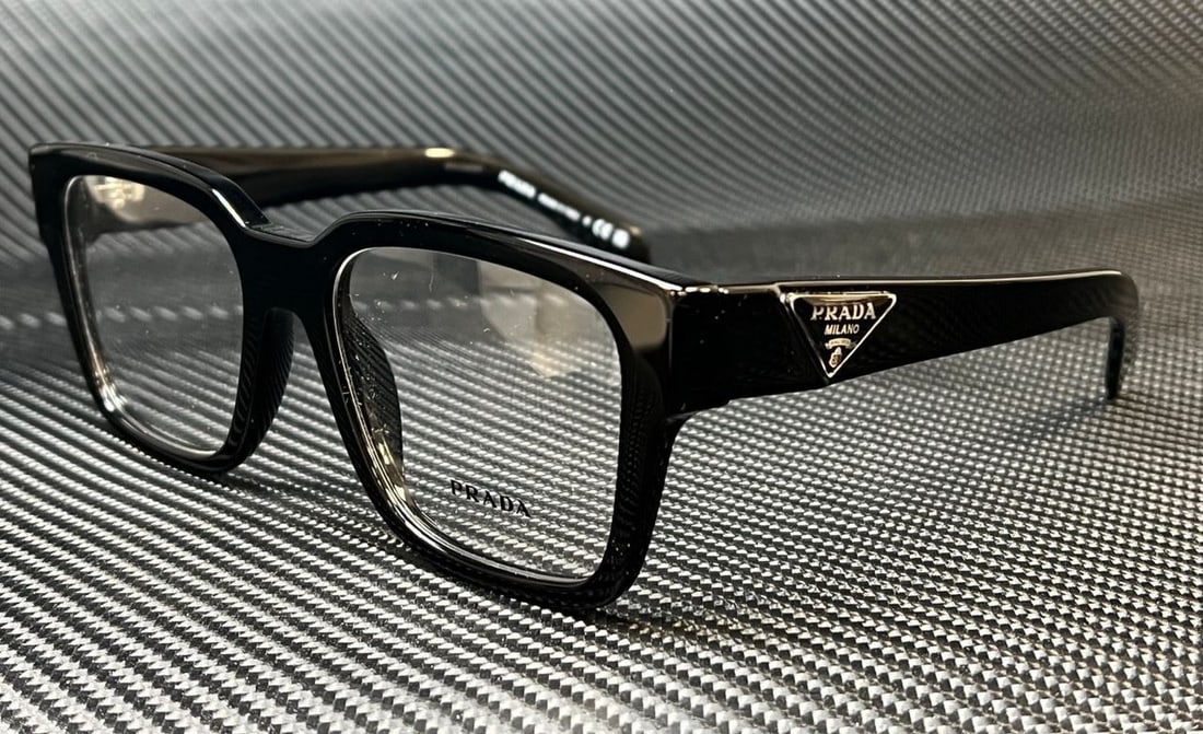 PRADA Black Mens Eyeglasses PR 08ZV 52 mm with Logo: PRADA Black Mens Eyeglasses PR 08ZV 52 mm with Logo These PRADA eyeglasses feature a sleek black frame designed for men. They are stylish and functional, perfect for everyday wear. The model PR 08ZV h