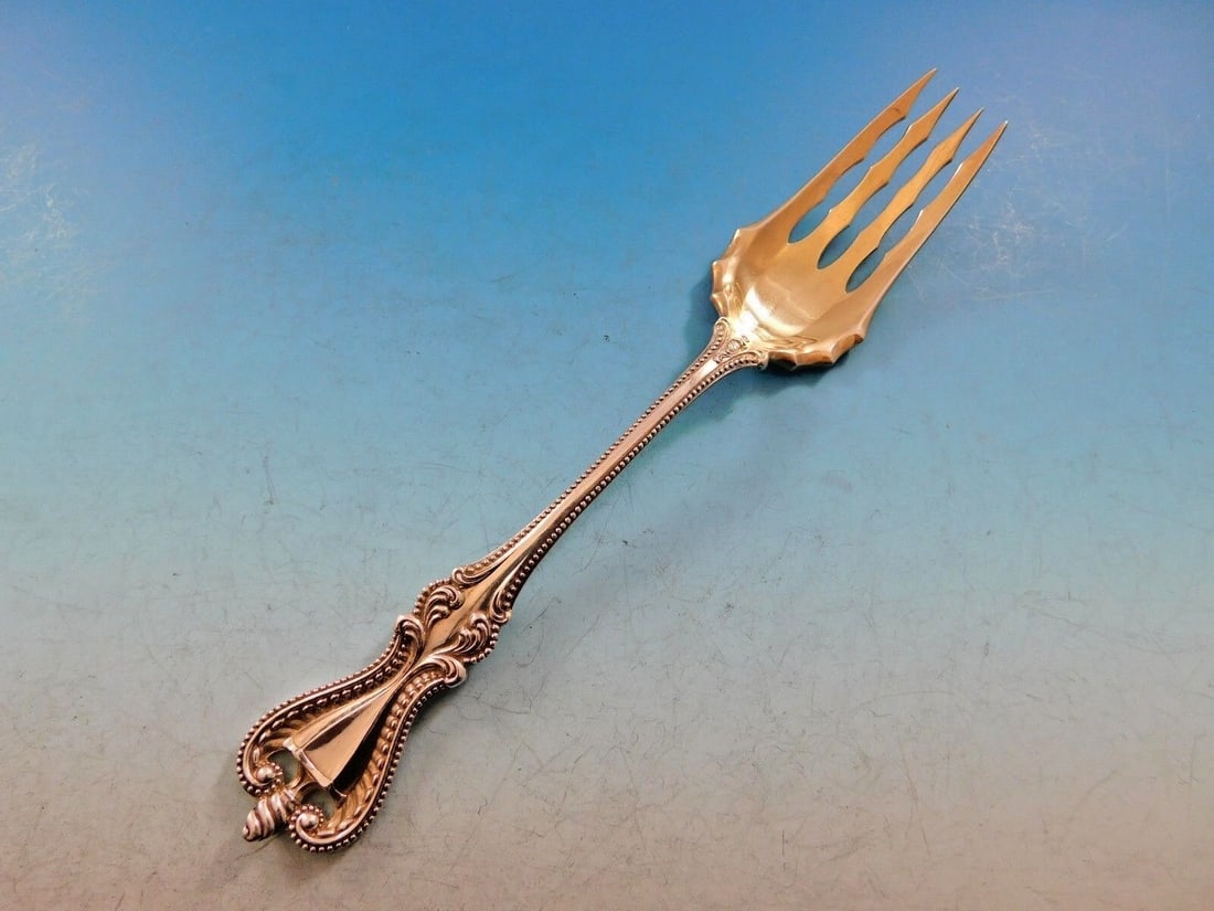 Towle Old Colonial Sterling Silver Beef Fork Gold-Washed 7.375 Inches: Towle Old Colonial Sterling Silver Beef Fork Gold-Washed 7.375 Inches This Old Colonial by Towle sterling silver beef fork features a beautiful gold-washed finish and measures 7 3/8". Crafted between 