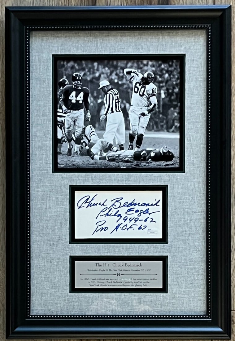 Chuck Bednarik Signed Framed Display Index Card JSA Authentication: Chuck Bednarik Signed Framed Display Index Card JSA Authentication Framed display featuring a signed index card by Chuck Bednarik, a legendary NFL player known for his iconic hit on Frank Gifford. The