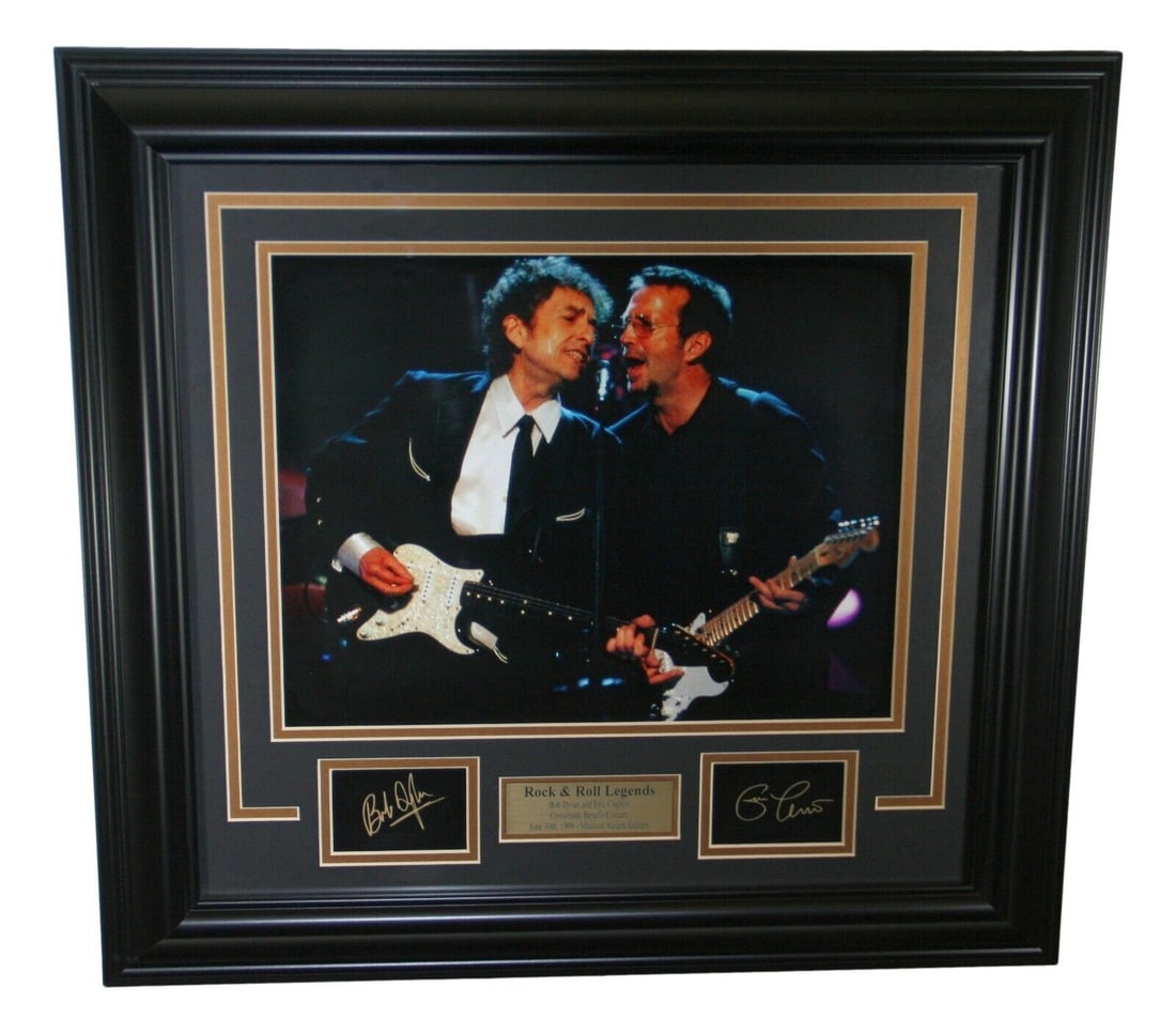Framed 22 Inch Bob Dylan Eric Clapton Music Photo Poster: Framed 22 Inch Bob Dylan Eric Clapton Music Photo Poster This is a framed photograph poster featuring the iconic artists Bob Dylan and Eric Clapton. The photo measures 22 x 21 inches and showcases a v