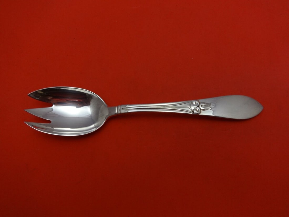 Frank Smith Tulipan Sterling Silver Ice Cream Fork 6 Inches: Frank Smith Tulipan Sterling Silver Ice Cream Fork 6 Inches This is a Tulipan ice cream fork made by Frank Smith. Crafted from sterling silver, this flatware piece showcases the elegant Tulipan patter