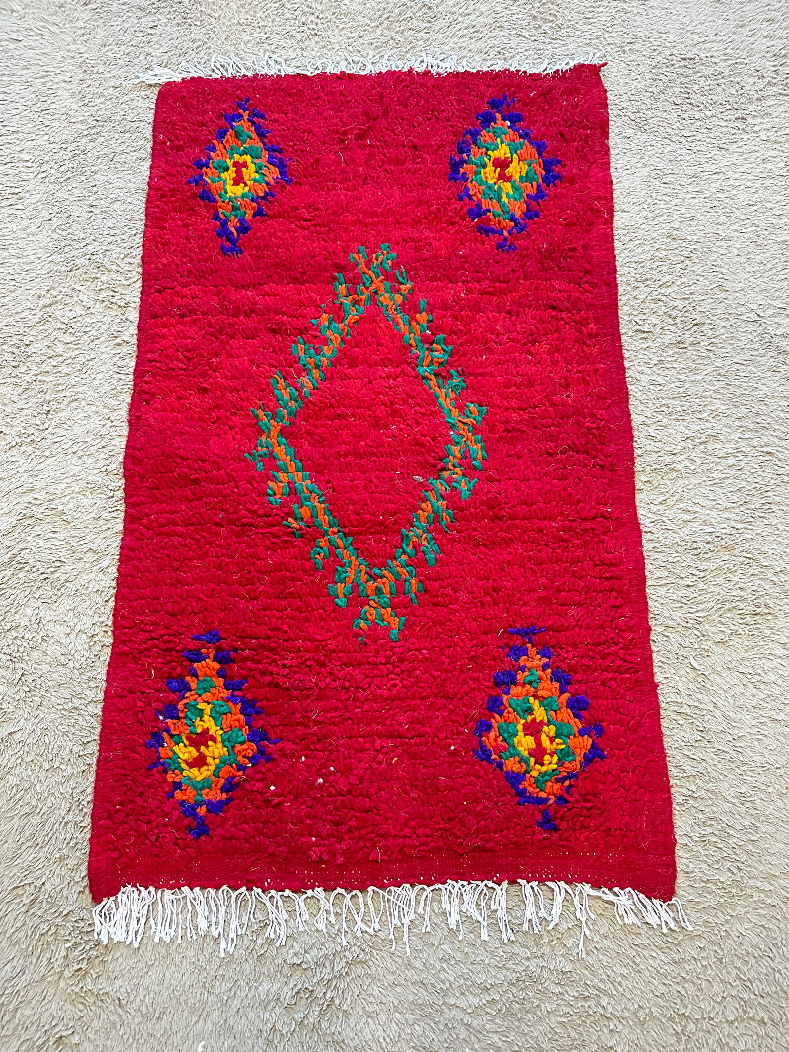 Authentic Moroccan Amazigh Hand-Knotted Rug 27 inches x 46 inches: Authentic Moroccan Amazigh Hand-Knotted Rug 27 inches x 46 inches Experience the artistry and tradition of Moroccan craftsmanship with this exquisite handmade Amazigh rug. Woven by skilled Amazigh wom