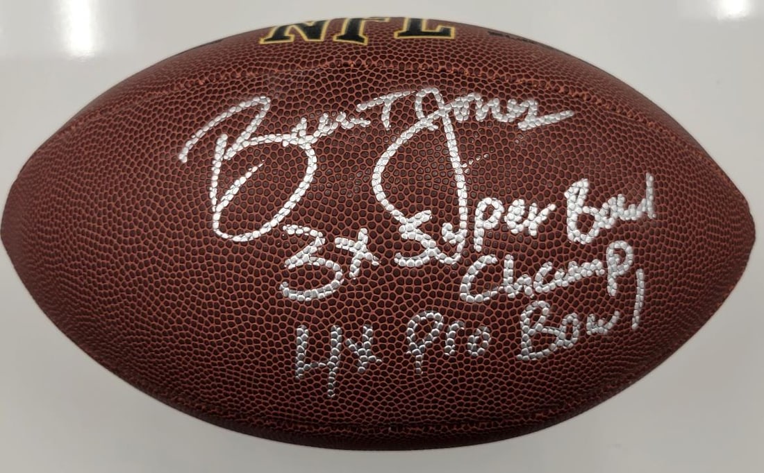 Brent Jones Signed NFL Football with Dual Inscriptions 49ers Beckett Authenticated: Brent Jones Signed NFL Football with Dual Inscriptions 49ers Beckett Authenticated This is an original NFL football signed by Brent Jones, the former player of the San Francisco 49ers. The ball featur