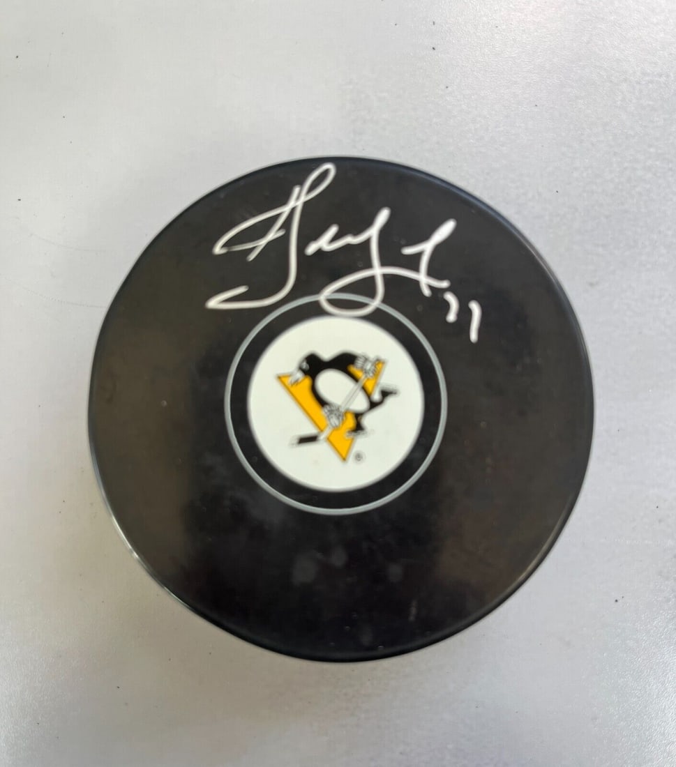 Alexei Kovalev Signed NHL Logo Puck Pittsburgh Penguins JSA Authenticated: Alexei Kovalev Signed NHL Logo Puck Pittsburgh Penguins JSA Authenticated This is an original NHL logo puck signed by Alexei Kovalev, a player for the Pittsburgh Penguins. The autograph has been authe