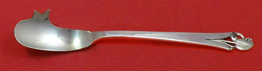 Frank Smith Woodlily Sterling Silver Cheese Knife 5 3/4 Inch: Frank Smith Woodlily Sterling Silver Cheese Knife 5 3/4 Inch This exquisite cheese knife features a flat handle and is crafted entirely from sterling silver, showcasing the elegant Woodlily pattern by