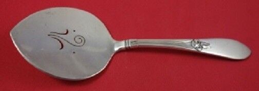 Frank Smith Tulipan Sterling Silver Cucumber Server 6.5 Inches: Frank Smith Tulipan Sterling Silver Cucumber Server 6.5 Inches This is a Tulipan by Frank Smith sterling silver cucumber server featuring a flat handle and a pierced design. Measuring 6 1/2" in length