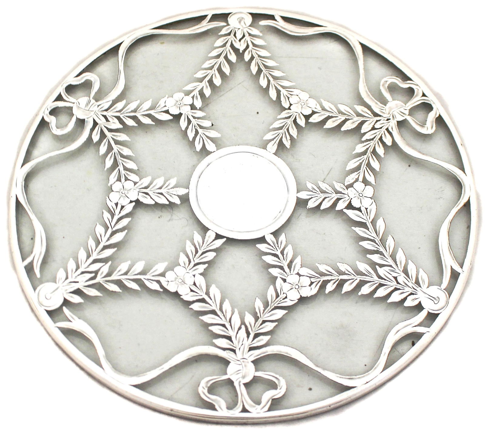 Sterling Silver Trivet by Webster & Company: Sterling Silver Trivet by Webster & Company This exquisite Sterling Silver trivet by Webster & Company features a glass top and measures 1 inch in height and 8 inches in diameter. Manufactured in the