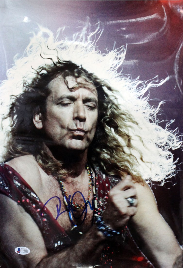 Robert Plant Signed 12x17 Photo with BAS Authentication: Robert Plant Signed 12x17 Photo with BAS Authentication This original 12x17 photograph is autographed by Robert Plant, the iconic lead vocalist of Led Zeppelin. It comes with BAS authentication for ve