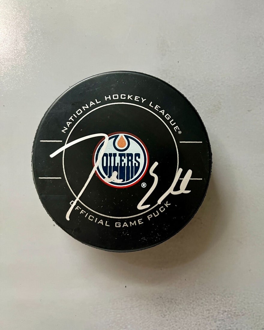Jordan Eberle Edmonton Oilers Signed NHL Puck with Beckett Authentication: Jordan Eberle Edmonton Oilers Signed NHL Puck with Beckett Authentication This is an original NHL logo puck signed by Jordan Eberle, a player from the Edmonton Oilers. The autograph is authenticated b