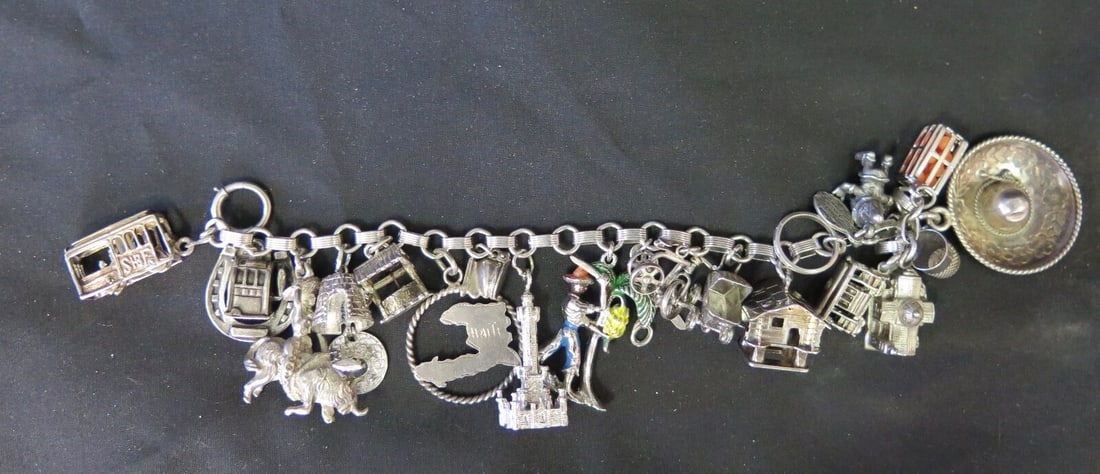 Vintage 1960s Sterling Silver Charm Bracelet with 20 Charms 7 inches: Vintage 1960s Sterling Silver Charm Bracelet with 20 Charms 7 inches Material: silver. Type: Charm Bracelet with Charms. Metal Purity: Not Applicable. Main Stone: No Stone. Metal: Sterling Silver. Thi