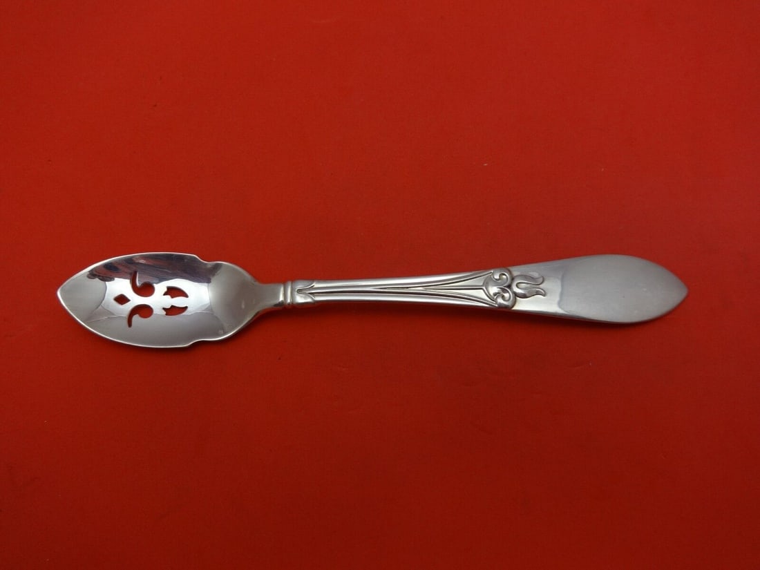Frank Smith Tulipan Sterling Silver Olive Spoon 5 3/4 inches Pierced Design: Frank Smith Tulipan Sterling Silver Olive Spoon 5 3/4 inches Pierced Design This is a custom-made olive spoon crafted from sterling silver, featuring a pierced design in the Tulipan pattern by Frank S