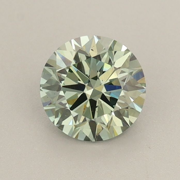 Ideal Loose Diamond - ROUND 0.74ct Fancy Vivid Green VS2: Ideal Loose Diamond - ROUND 0.74ct Fancy Vivid Green VS2 Source: This is a real non-mined Diamond that has been grown in a lab Shape: ROUND Carats: 0.74 Color: Fancy Vivid Green Certification: IGI Vid