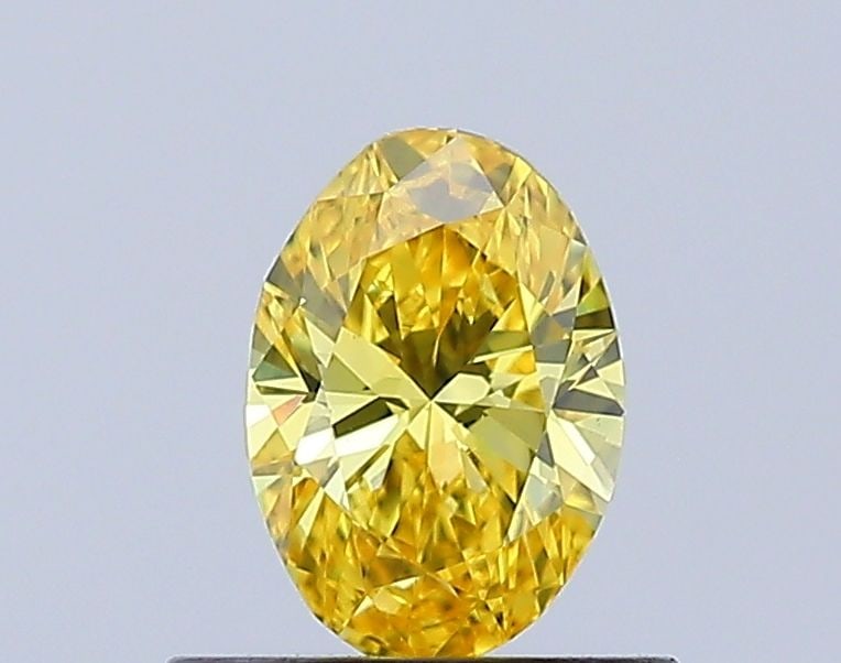 Loose Diamond - OVAL 0.46ct Fancy Vivid Yellow VVS2: Loose Diamond - OVAL 0.46ct Fancy Vivid Yellow VVS2 Source: This is a real non-mined Diamond that has been grown in a lab Shape: OVAL Carats: 0.46 Color: Fancy Vivid Yellow Certification: IGI Video: