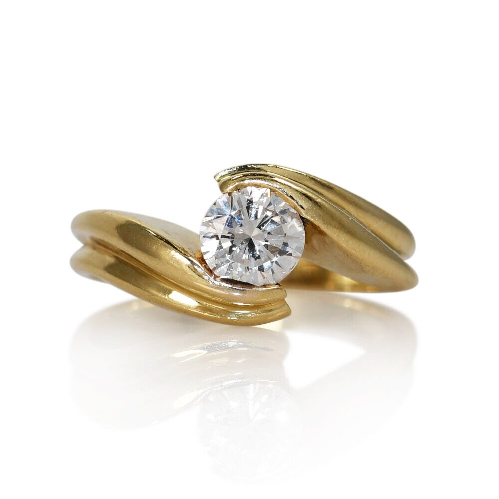 14K Yellow Gold Diamond Ring .67ct G I1 Round Cut Size 6.75: 14K Yellow Gold Diamond Ring .67ct G I1 Round Cut Size 6.75 This exquisite 14K Yellow Gold Diamond Solitaire ring features a stunning round brilliant cut diamond weighing .67 carats, graded G for colo