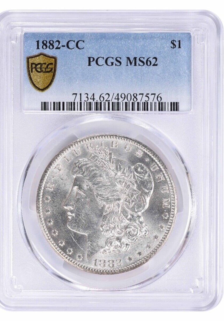1882-CC Morgan Silver Dollar MS62 Uncirculated Coin PCGS Certified: 1882-CC Morgan Silver Dollar MS62 Uncirculated Coin PCGS Certified This 1882-CC Morgan Silver Dollar is certified by PCGS and is in an uncirculated condition. The coin has a composition of 90% silver 