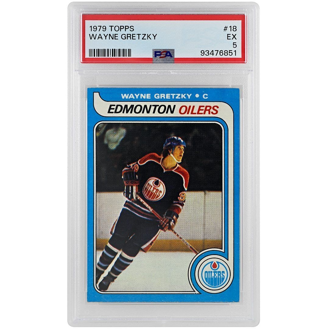 1979 Tops Wayne Gretzky Rookie Card #18 PSA Grade 5 Edmonton Oilers: 1979 Tops Wayne Gretzky Rookie Card #18 PSA Grade 5 Edmonton Oilers This is a 1979 Tops Wayne Gretzky #18 Rookie Card, graded PSA 5. It is a slabbed hockey card featuring Wayne Gretzky, widely regarde