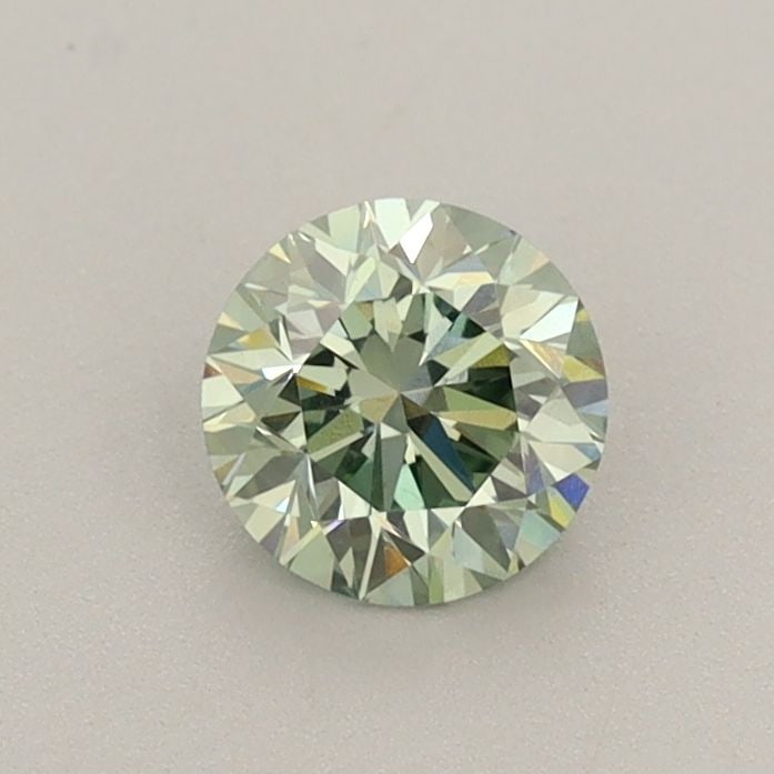 Loose Diamond - ROUND 0.54ct Fancy Vivid Green VS1: Loose Diamond - ROUND 0.54ct Fancy Vivid Green VS1 Source: This is a real non-mined Diamond that has been grown in a lab Shape: ROUND Carats: 0.54 Color: Fancy Vivid Green Certification: IGI Video: