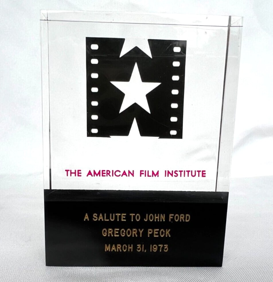 Gregory Peck American Film Institute Trophy 1973 Tribute: Gregory Peck American Film Institute Trophy 1973 Tribute This trophy from the Estate of Gregory Peck was awarded by The American Film Institute in a tribute titled "Salute to John Ford" on March 31st,