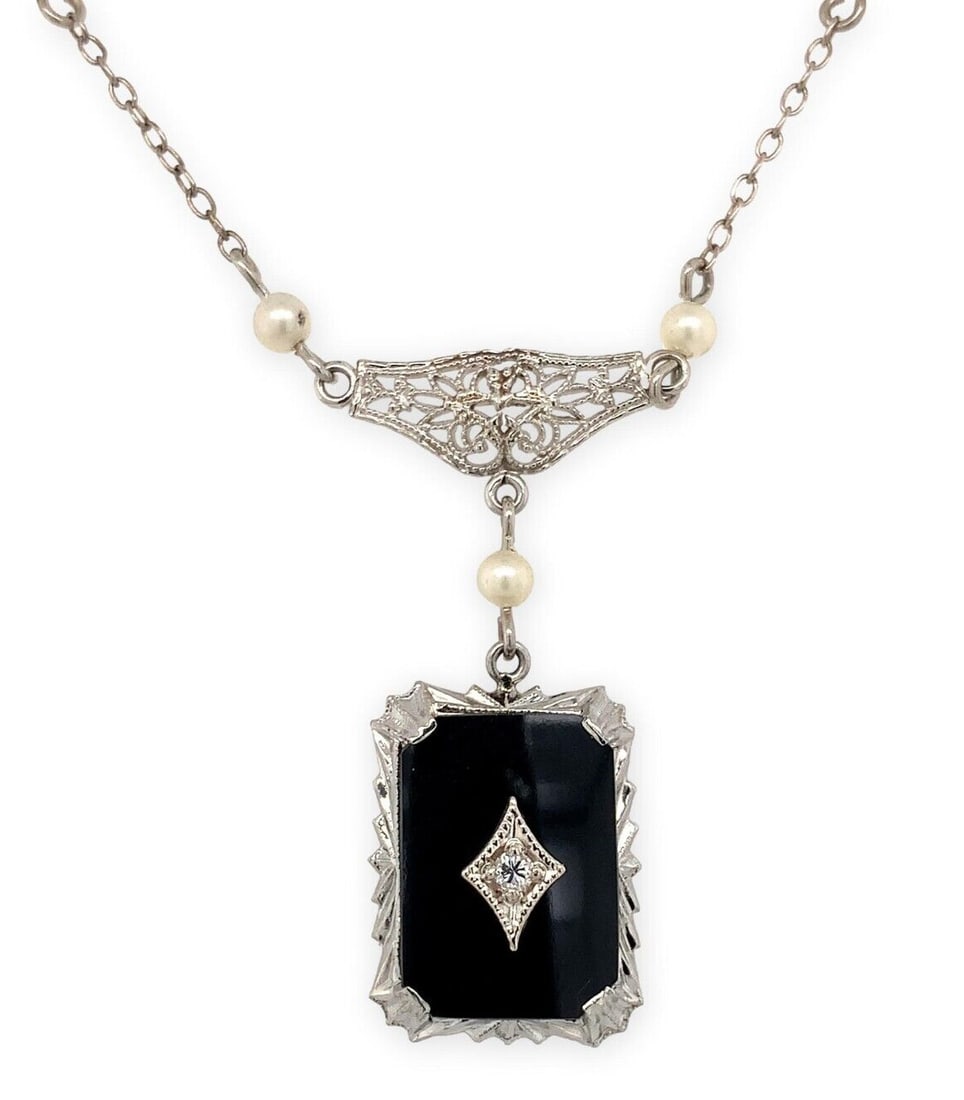 Filigree 10k Gold Black Onyx Necklace with Diamond Pearl Bead Accents: Filigree 10k Gold Black Onyx Necklace with Diamond Pearl Bead Accents Seller Notes: " Estate piece in excellent condition." Number Of Diamonds: 1 Color: Black Clear Cream Silver Material: Metal Main S