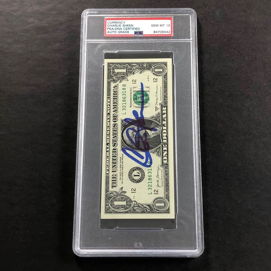Charlie Sheen Signed Dollar Bill PSA/DNA Slabbed Auto Grade 10: Charlie Sheen Signed Dollar Bill PSA/DNA Slabbed Auto Grade 10 Pre-Owned While the lot images are representative of the item, the size, placement and strength of the signature may vary. Each item is h