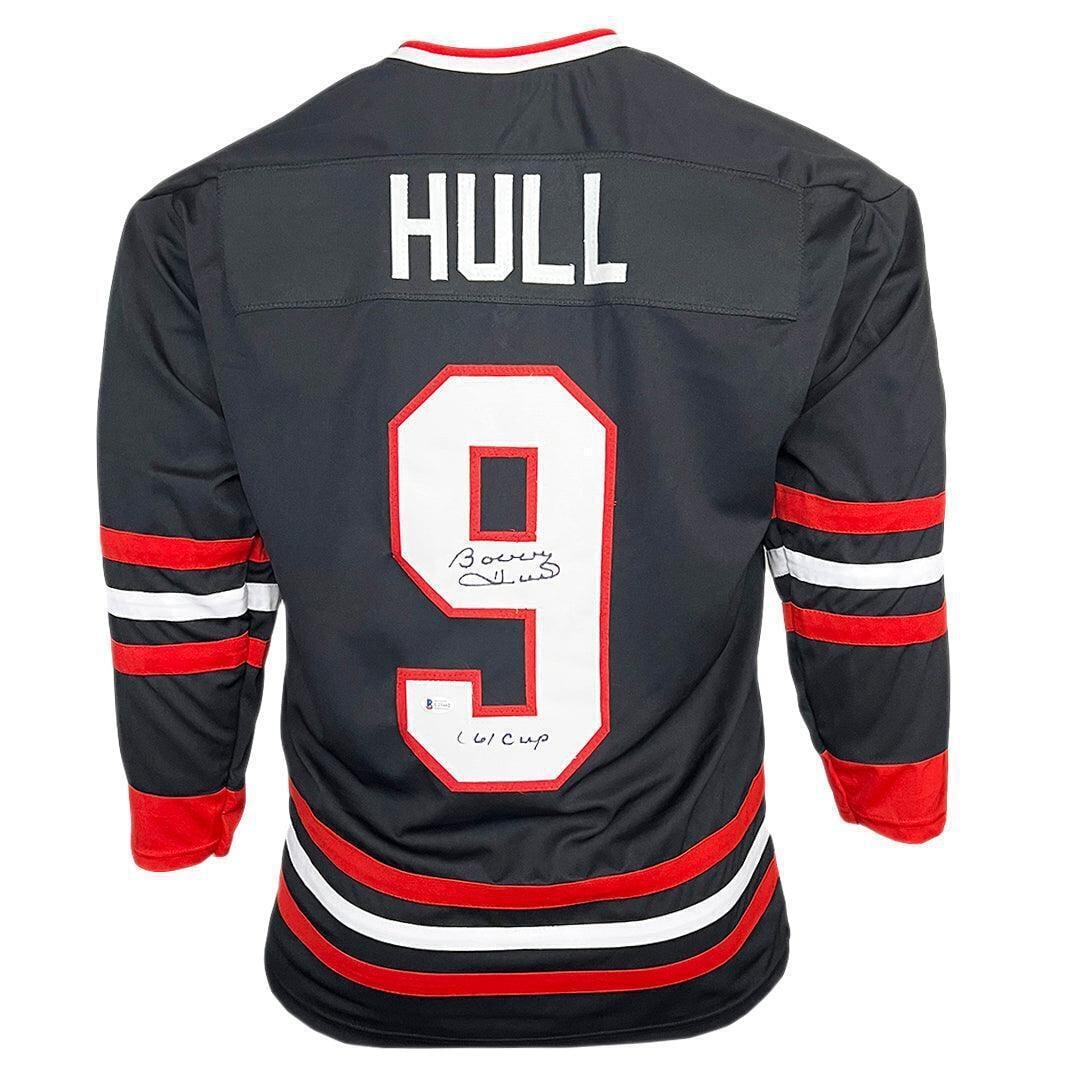 Bobby Hull Signed 61 Cup Inscription Chicago Black Hockey Jersey (Beckett): Bobby Hull Signed 61 Cup Inscription Chicago Black Hockey Jersey (Beckett) Autograph Authentication: Beckett Autographed: Yes League: NHL Size: XL Sport: Hockey Bobby Hull Signed 61 Cup Inscription Ch