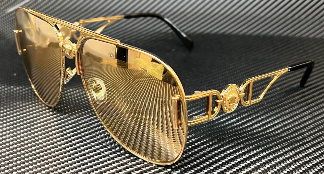 VERSACE VE2255 100203 Gold Mirror Unisex Large 63 mm Sunglasses: VERSACE VE2255 100203 Gold Mirror Unisex Large 63 mm Sunglasses Frame Color: Gold Type: Sunglasses New The MYNT Guarantee: All items in this auction are guaranteed to be 100% authentic. At Your Servic