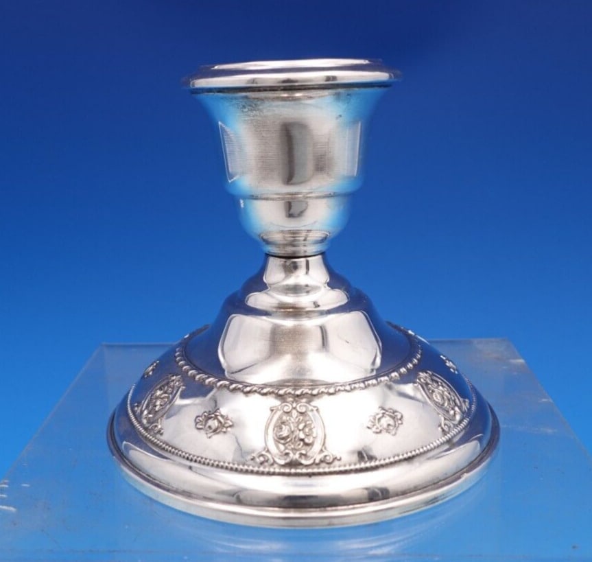 Rose Point by Wallace Sterling Silver Candlestick #4640-9 3 1/2": Rose Point by Wallace Sterling Silver Candlestick #4640-9 3 1/2" Brand: Wallace Pattern: Rose Point Composition: Sterling Silver (.925) Type: Candlestick Age: 1900-1940 Maker: Wallace Rose point by wa