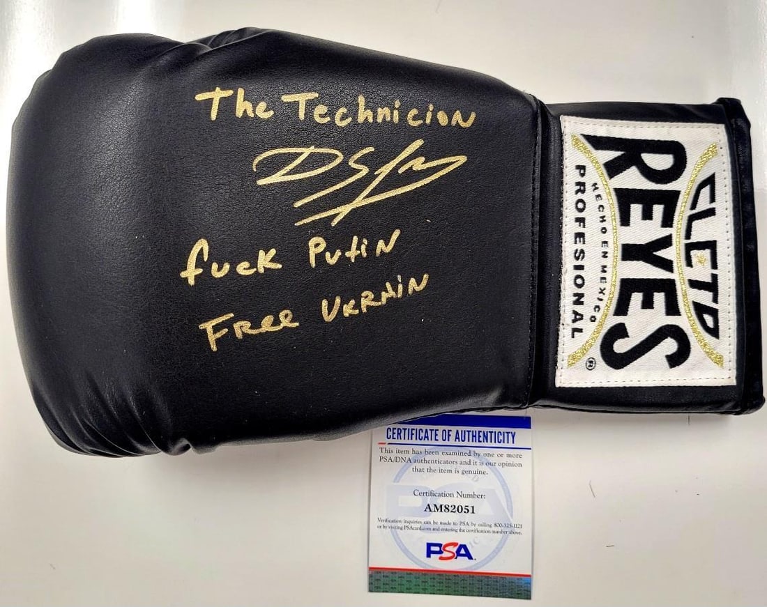 Sergiy Derevyanchenko signed "F- Putin" Boxing Glove autograph ~ PSA/DNA COA: Sergiy Derevyanchenko signed "F- Putin" Boxing Glove autograph ~ PSA/DNA COA Original/Reprint: Original Product: Glove Sport: Boxing Autograph Authentication: Professional Sports Authenticator (PSA) P