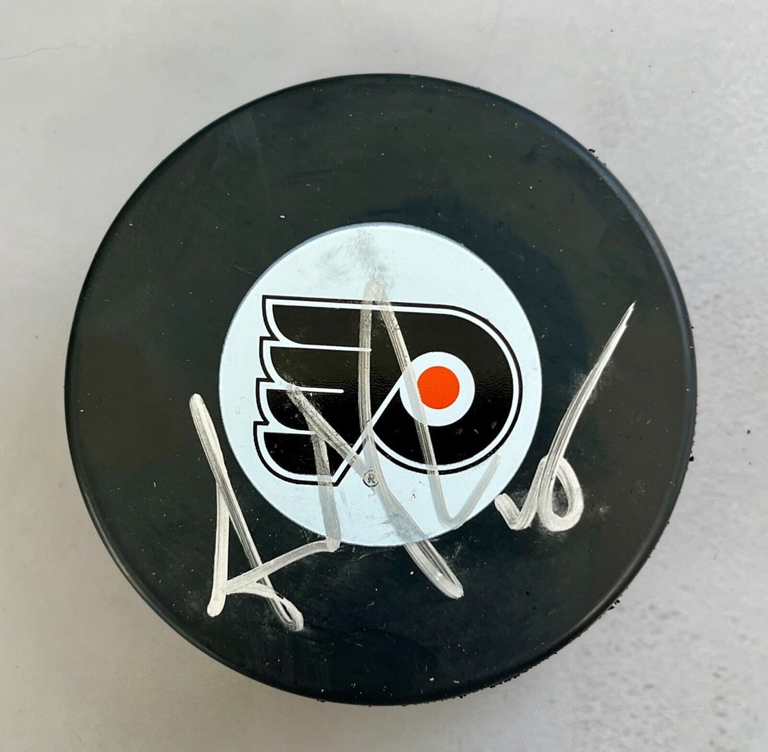 Aaron Asham (Philadelphia Flyers) signed NHL Logo puck: Aaron Asham (Philadelphia Flyers) signed NHL Logo puck Sport: Hockey Player: Arron Asham Signed: Yes Original/Reprint: Original Autograph Authentication: . Product: Puck Team: Philadelphia Flyers None