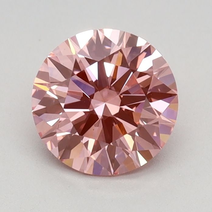 Ideal Loose Diamond - ROUND 0.84ct Fancy Vivid Pink VS1: Ideal Loose Diamond - ROUND 0.84ct Fancy Vivid Pink VS1 Source: This is a real non-mined Diamond that has been grown in a lab Shape: ROUND Carats: 0.84 Color: Fancy Vivid Pink Certification: IGI Video