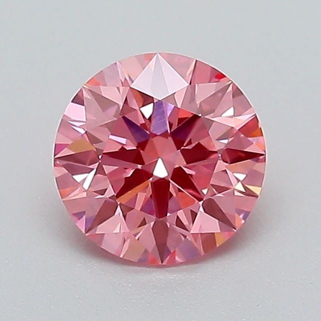 Ideal Loose Diamond - ROUND 0.82ct Fancy Vivid Pink VS1: Ideal Loose Diamond - ROUND 0.82ct Fancy Vivid Pink VS1 Source: This is a real non-mined Diamond that has been grown in a lab Shape: ROUND Carats: 0.82 Color: Fancy Vivid Pink Certification: IGI Video
