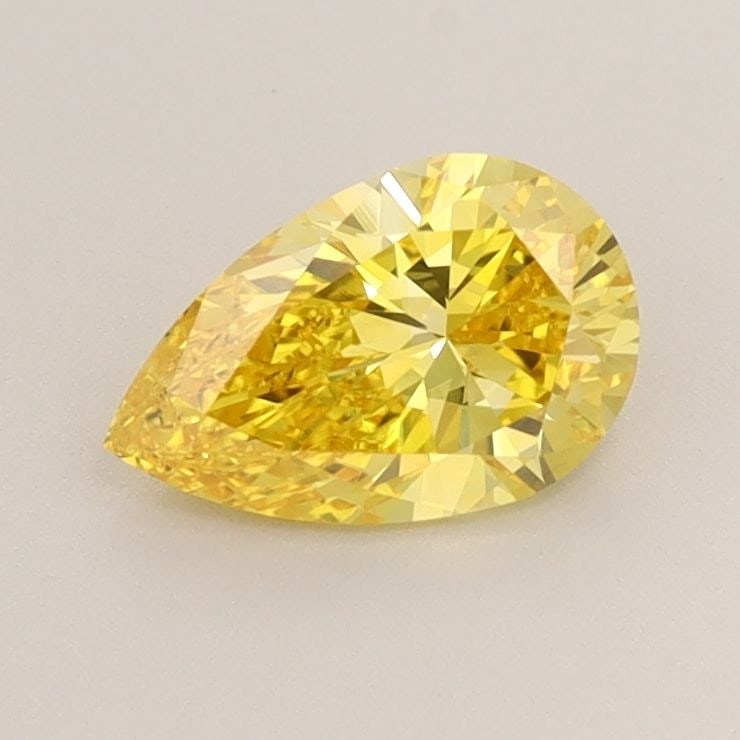 Loose Diamond - PEAR 0.79ct Fancy Vivid Yellow VVS2: Loose Diamond - PEAR 0.79ct Fancy Vivid Yellow VVS2 Source: This is a real non-mined Diamond that has been grown in a lab Shape: PEAR Carats: 0.79 Color: Fancy Vivid Yellow Certification: IGI Video: