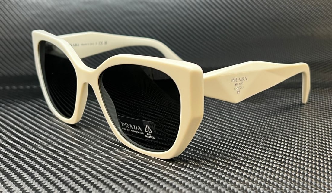PRADA PR 19ZS White Talk Grey Women's 55mm Sunglasses: PRADA PR 19ZS White Talk Grey Women's 55mm Sunglasses Stylish PRADA PR 19ZS 1425S0 women's sunglasses featuring a sleek white frame. These sunglasses are perfect for adding a chic touch to any outfit.